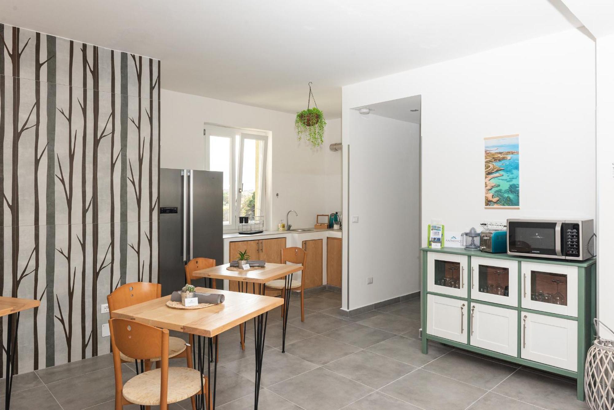 Guest House - Affittacamere Green Apartment - By Faendho Porto Torres Exterior foto
